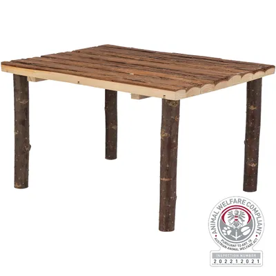 Mesa de madera de materiales naturales con sello de bienestar animal 'Animal Welfare Compliant', número de inspección 202212021 según la ley austriaca de protección animal art. 18.