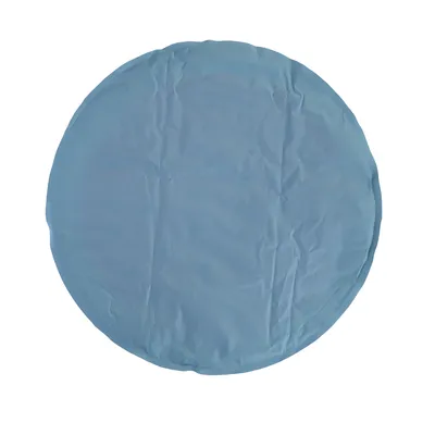 Tapis rond bleu uni, matière plastique visible, sans marque ni texte apparent.