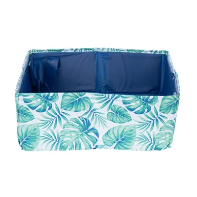 Pojemnik do przechowywania z tropikalnym wzorem liści, niebieską podszewką i kieszeniami z siatki.