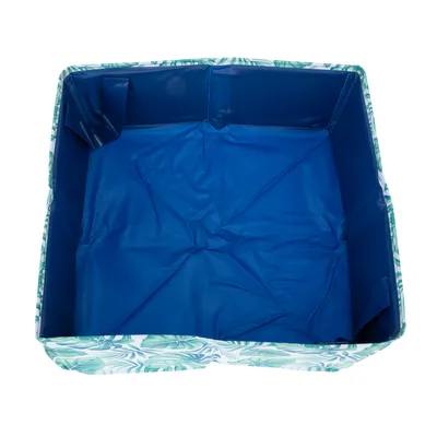 Niebieski składany pojemnik z tropikalnym wzorem liści po bokach, odpowiedni do różnych zastosowań.