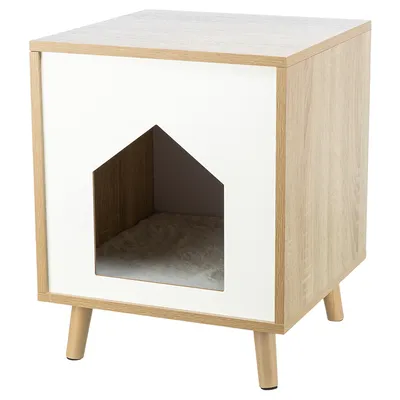 Wooden pet furniture with white front and triangular entrance, padded interior, four wooden legs.