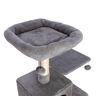 Árbol rascador gris con superficie acolchada para tumbarse, poste de sisal y dos pelotas colgantes para jugar.
