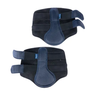 Paire de protections noires et bleues pour pattes, surface en tissu alvéolé, deux sangles à scratch, étiquette bleue avec texte blanc « TRIXIE » visible sur chaque protection.