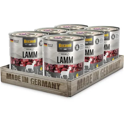 Belcando Dog Food Baseline lamb, Made in Germany, 70% rich in lamb. Six cans on wooden tray with 'Made in Germany' inscription.