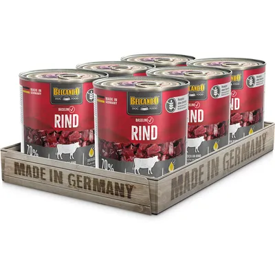 Belcando Dog Food Baseline beef, 70% meat content, Made in Germany. Six cans on wooden tray with 'Made in Germany' label.