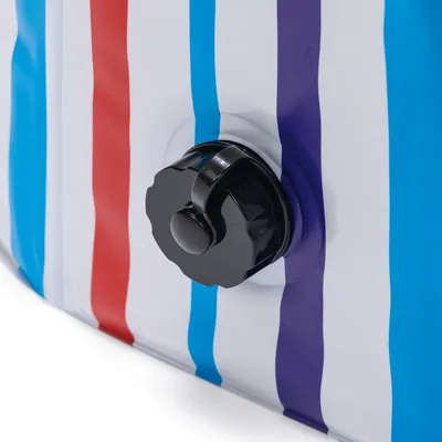 Close-up of a black rotary valve on a product with red, blue and purple stripes.