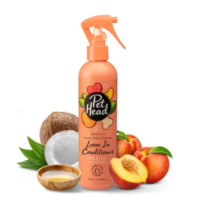 Pet Head Quick Fix Leave In Conditioner Peach mit Arganöl, 300ml. Enthält natürliche Extrakte. Abgebildet mit Kokosnuss, Pfirsich und Pflanzenöl.
