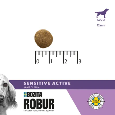 Bozita Robur Sensitive Active Lam, brokgrootte 12 mm voor volwassen honden, schaal geeft diameter aan. Gemaakt in Zweden, zonder tarwe, pure ingrediënten.