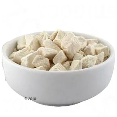 White bowl with small, light dry food pieces. Product image without visible brand or text information.