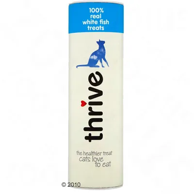 100% real white fish treats, the healthier treat cats love to eat, shown on cylindrical packaging with a blue cat silhouette and thrive branding.