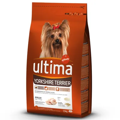 Saco de pienso Affinity Ultima Yorkshire Terrier, 1,5 kg. Texto visible: pollo, arroz, cereales integrales, sin colorantes ni conservantes. Imagen de ingredientes en la parte frontal.