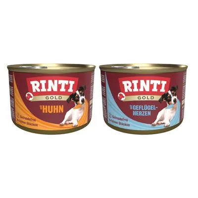 Twee blikken Rinti Gold hondenvoer: één met opschrift 'Huhn', de ander met 'Geflügelherzen'. Beide tonen een hond en vermelden 'Graanvrij, kleine stukken'.