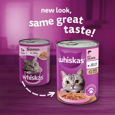 Whiskas macskaeledel konzerv, lazacos, in jelly. Régi és új csomagolás látható. Felirat angolul: new look, same great taste!