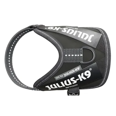 Julius-K9 IDC-Power dog harness in black with reflective stripes and sturdy metal ring for leash attachment.
