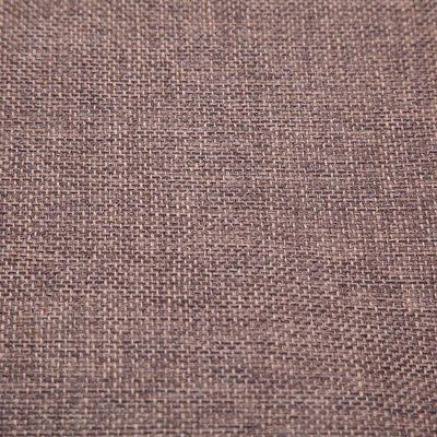 Gros plan sur un tissu tissé marron, matériau visible utilisé pour la fabrication du produit.
