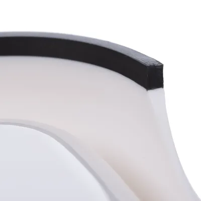 Close-up of a white bowl with a black non-slip rim, suitable for pet food or water.