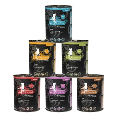 6 lattine Catz finefood: N°113 Pecora, N°107 Canguro, N°105 Salmone, N°103 Pollo, N°111 Agnello, N°109 Cinghiale. Testo multilingue sugli ingredienti visibile su ogni lattina.