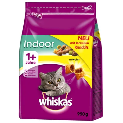 Whiskas Indoor 1+ Jahre cat food, 950g pack, with visible text: NEU mit leckeren Knackits, mit Huhn. Purple and green packaging with image of a grey cat and kibble pieces.