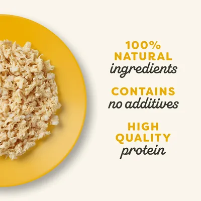 Shredded food on a yellow plate with text: 100% natural ingredients, contains no additives, high quality protein.
