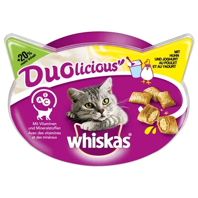 Envase de Whiskas Duolicious con imagen de gato, trozos rellenos, texto '+20% mehr Inhalt', 'Mit Huhn und Joghurt', y símbolo de vitaminas A, C, E. Texto en alemán y francés visible.