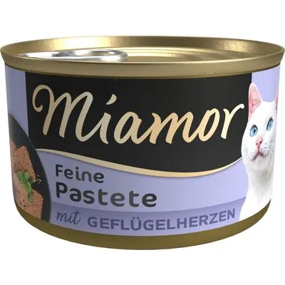 Miamor Feine Pastete mit Geflügelherzen, afbeelding van kattenvoerblik met witte kat en productnaam. Tekst op blik deels in het Duits.