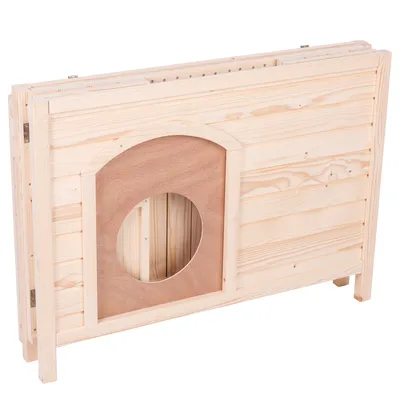 Élément en bois clair avec ouverture ronde, panneaux assemblés et charnières visibles, structure pliée montrant l'entrée découpée. Aucun texte ou marque visible.