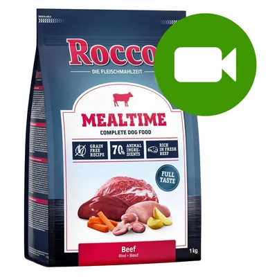 Rocco Mealtime Complete Dog Food Beef, 1 kg. Widoczne napisy: grain free recipe, 70% animal ingredients, rich in fresh beef, full taste. Opakowanie z ilustracją mięsa i warzyw.