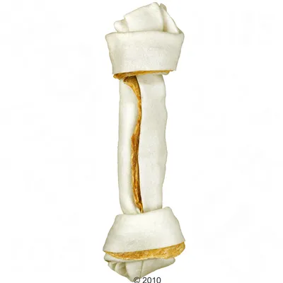 Rolled chew stick with a white exterior and visible brown filling, shaped like a bone. Shows product form and texture for assessing size and composition.