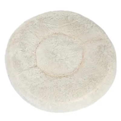 Round, plush, cream-coloured pet bed with a raised edge and soft, fluffy texture, shown from above to display its circular shape and cushioned centre.