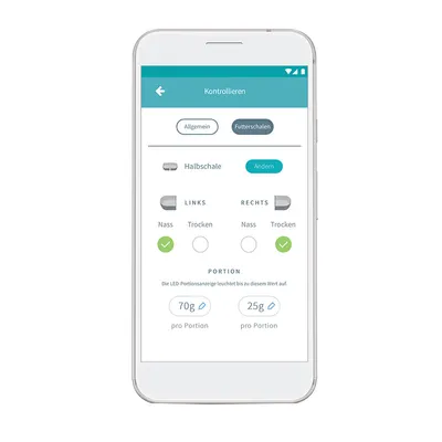 App-Bildschirm zur Steuerung von Futterschalen. Optionen: Nass- oder Trockenfutter, Portionen links 70g, rechts 25g. LED-Anzeige leuchtet bis zum eingestellten Wert.