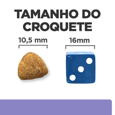Tamanho do croquete: 10,5 mm ao lado de um dado azul de 16 mm para comparação visual.
