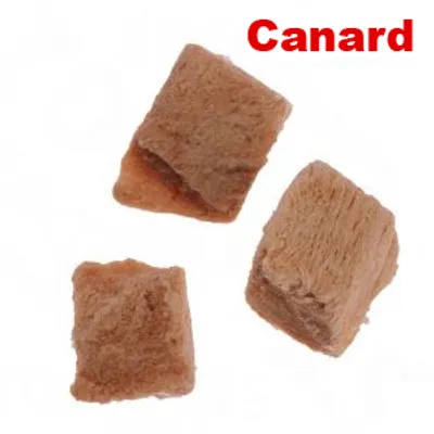 Morceaux de friandises bruns, texte visible : Canard en haut à droite