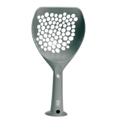 Catit-merkkinen harmaa muovinen kissanhiekkalapio, jossa pyöreitä reikiä ja tukeva varsi. Catit-logo näkyy varressa.