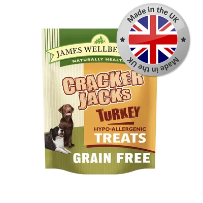 Cracker Jacks turkey hypo-allergenic treats, grain free, made in the UK. Packaging shows two dogs and highlights naturally healthy product features.