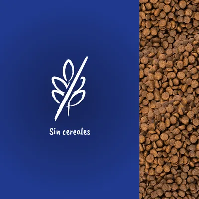 Texto visible: Sin cereales, con símbolo de espiga tachada. Pienso marrón a la derecha. Indica que el producto no contiene cereales.