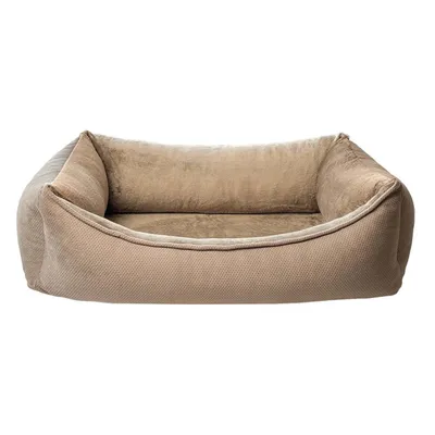 Rektangulær, beige seng med blød kant og polstret liggeflade. Rektangulær, beige seng med blød kant og polstret liggeflade.