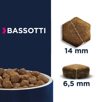 Crocchette per cani Bassotti, vista della ciotola e dettaglio di una crocchetta con misure: 14 mm di diametro e 6,5 mm di spessore.