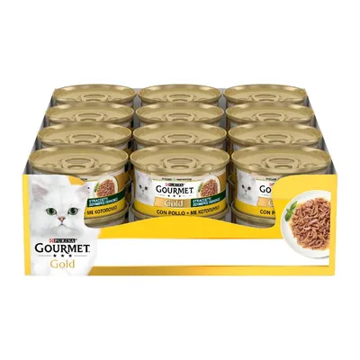 Confezione da 12 lattine Purina Gourmet Gold Straccetti con pollo per gatti, etichetta visibile con immagine di gatto bianco e piatto di straccetti.