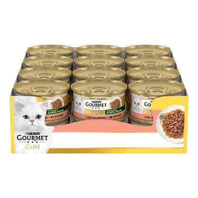 Confezione da 12 lattine Purina Gourmet Gold Straccetti con salmone per gatti, etichetta visibile con immagine di gatto bianco e piatto di straccetti.