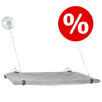 Cama gris para gatos con ventosas transparentes para fijación en ventana. Círculo rojo con símbolo de porcentaje blanco indicando oferta o descuento visible.