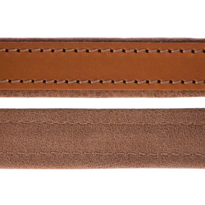 Close-up of two brown leather straps with visible stitching, different textures and shades.