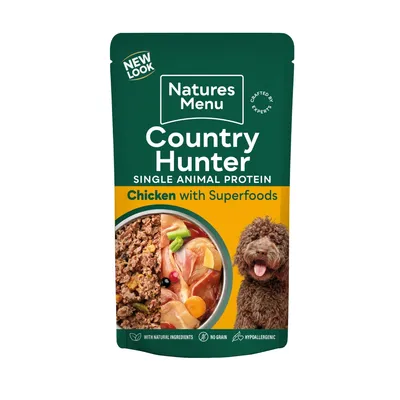 Country Hunter single animal protein chicken with superfoods, with natural ingredients, no grain, hypoallergenic. Image shows food and a dog.