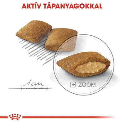 Közelkép töltött állateledel falatokról, felül piros szöveg: AKTÍV TÁPANYAGOKKAL. Bal alsó sarokban 1 cm-es méretjelzés látható.