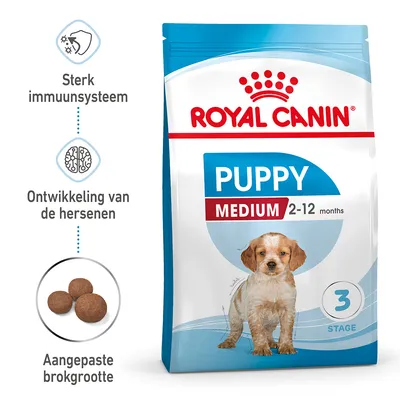 Royal Canin Puppy Medium 2–12 months hondenvoer, sterke immuunsysteem, ontwikkeling van de hersenen, aangepaste brokgrootte, verpakking met hond en blauwe accenten, fase 3 stage