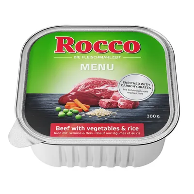 Rocco Menu, Rind mit Gemüse und Reis, angereichert mit Kohlenhydraten, 300 g. Verpackung zeigt Fleischstück, Erbsen, Karotten und Reis.