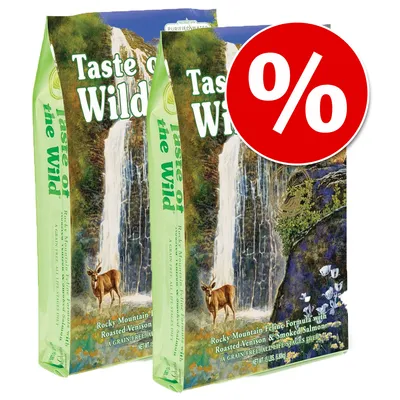 Twee zakken Taste of the Wild Rocky Mountain Feline Formula met Roasted Venison & Smoked Salmon, grote rode kortingssymbool met procentteken zichtbaar.