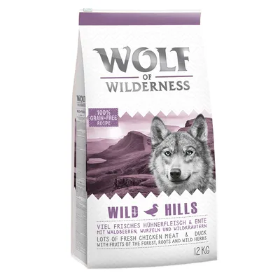 Sac de croquettes Wolf of Wilderness Wild Hills, 100 % grain-free recipe, 12 kg, avec texte en anglais et allemand sur poulet frais, canard, fruits des bois, racines et herbes sauvages.