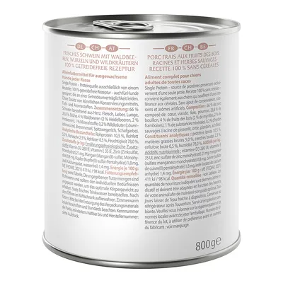 Tin labelled: Fresh pork with forest berries, roots and wild herbs. 100% grain-free recipe. Complete food for adult dogs of all breeds. Content: 800g.
