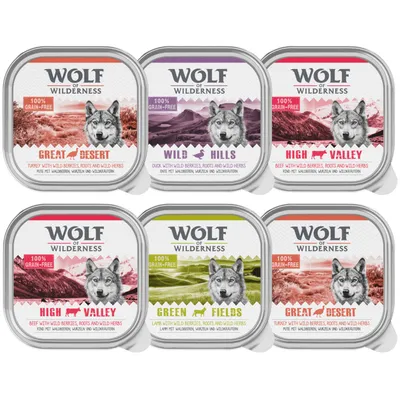 Wolf of Wilderness Nassfutter, 100% getreidefrei. Sorten: Great Desert (Truthahn), Wild Hills (Ente), High Valley (Rind), Green Fields (Lamm). Mit Waldbeeren, Wurzeln und Wildkräutern.