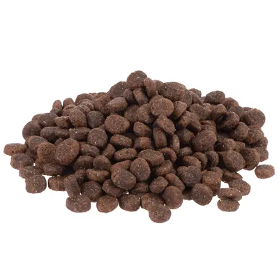 Tørfoder i små, runde brune piller vist i en bunke. Ingen synlig emballage eller mærkning.